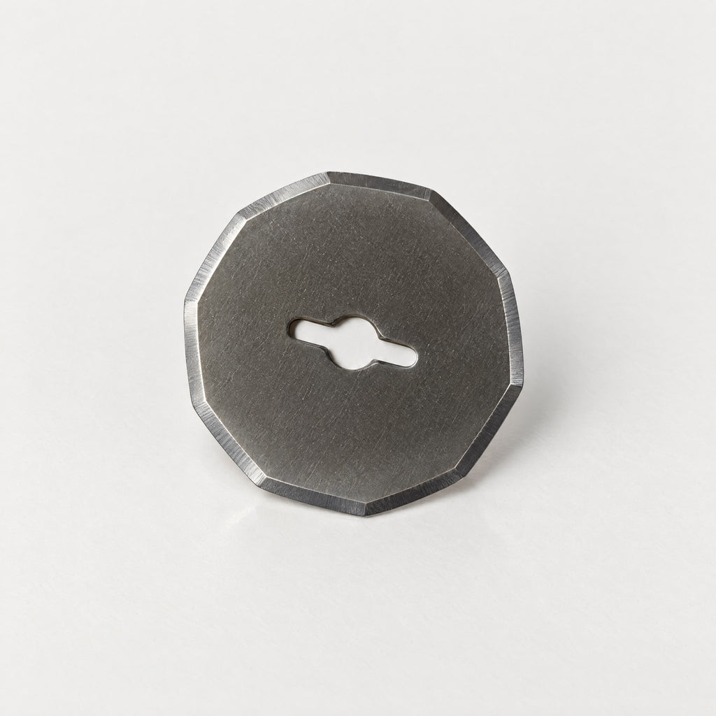 A single replacement blade for the cordless rotary scissors