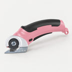 Cordless rotary scissors in pink with a black grip